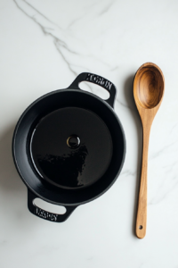 This image shows a soup pot or Dutch oven being heated over medium-high heat.