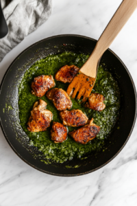 adding-seared-chicken-back-into-the-poblano-sauce
