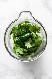 blending-roasted-poblano-peppers-into-a-smooth-sauce-for-chicken-poblano