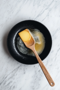 This image shows chicken pieces being placed in a bowl, ready for marination with flavorful ingredients to infuse them with a savory teriyaki taste.