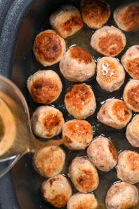 Place them gently into the slow cooker