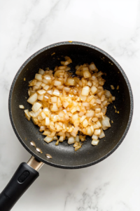 sauteing-onion-and-garlic-in-a-pan-for-rice-pilaf