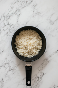 toasting-orzo-and-rice-in-a-pan-before-adding-broth