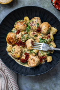 spoon the meatballs and gnocchi