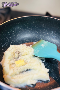 Sprinkle pepper, garlic powder, salt, and butter