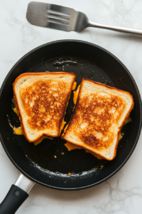 grilled-cheese-sandwiches-cooking-on-a-skillet