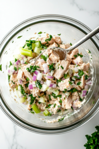 stirring-tuna-salad-mixture-until-well-combined-3013749-683x1024