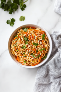 final-toss-of-thai-noodle-salad-before-serving