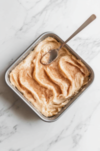 spreading-the-remaining-batter-evenly-in-the-baking-pan