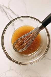 glass-bowl-melted-butter-brown-granulated-sugar-whisked-together