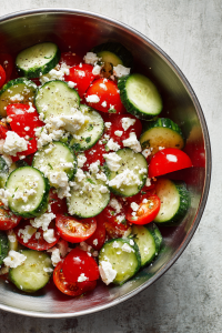 Crumbling the Feta Cheese over Vgetables