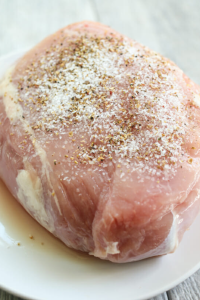 Pat the pork dry and season