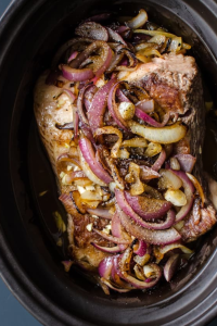 Pour the apple cider mixture evenly over the pork