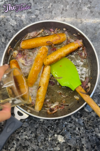 Pour the beer into the skillet with the onions