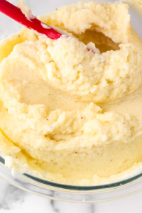 Mash the potatoes until smooth