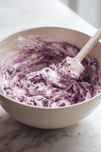 Toss the mulberries with a teaspoon of flour